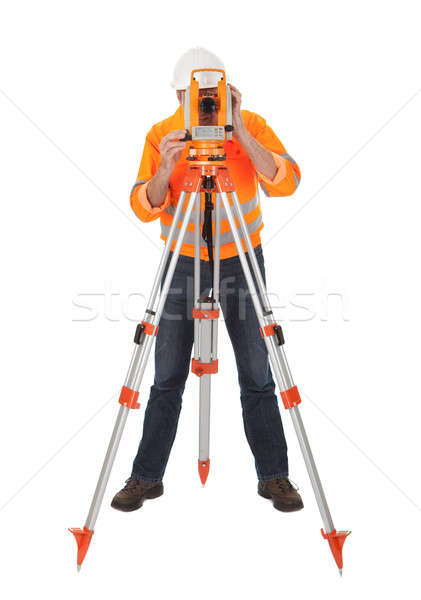 Senior land surveyor with theodolite Stock photo © AndreyPopov