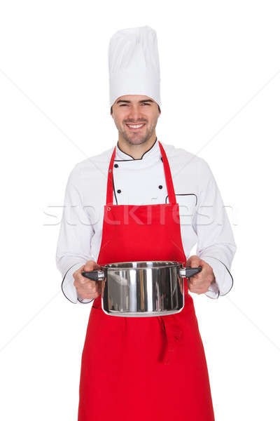 Portrait of cheerful chef holding pot Stock photo © AndreyPopov