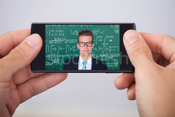 Man Attending Online Math's Lecture Stock photo © AndreyPopov