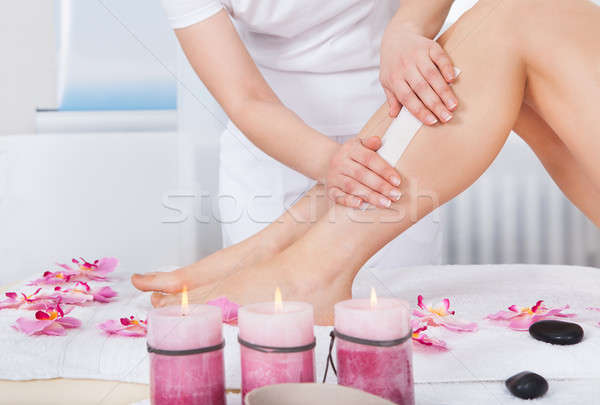 épilation à la cire jambe cire fleur corps [[stock_photo]] © AndreyPopov