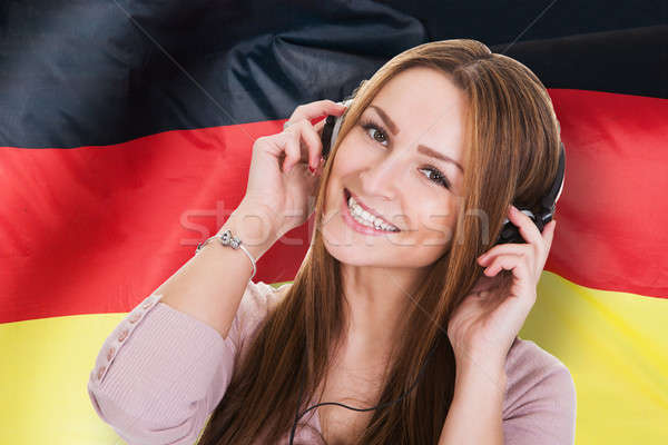Woman Listening German Learning Audiobook Stock photo © AndreyPopov