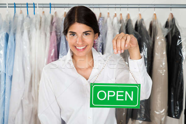 Female Store Owner With Open Sign Board Stock photo © AndreyPopov