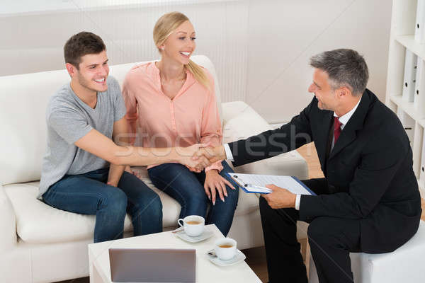 Consultant Shaking Hands To Man With Wife Stock photo © AndreyPopov