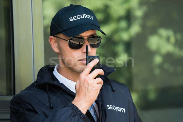 Stock fotó: Fiatal · biztonsági · őr · beszél · portré · biztonság · rendőrség