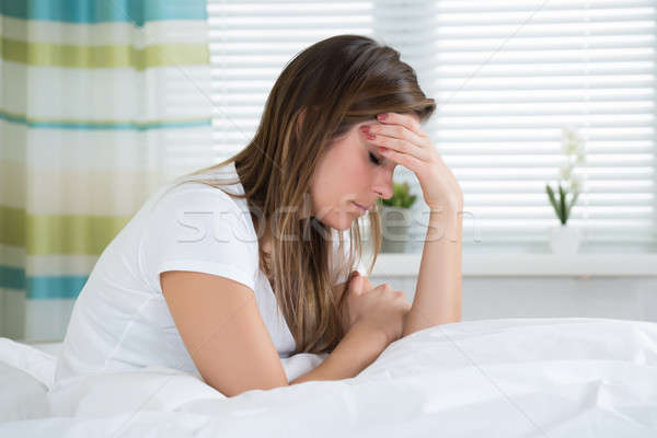 Mujer sufrimiento dolor de cabeza retrato femenino Foto stock © AndreyPopov