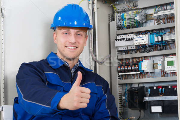 Stock photo: Portrait Of A Happy Young Male Electrician