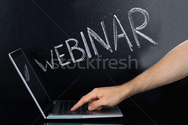 Person Hand Using Laptop For Webinar Stock photo © AndreyPopov