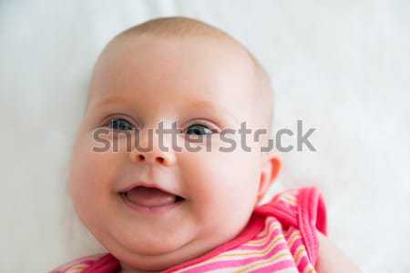 Portret niewinny baby język na zewnątrz dziewczyna Zdjęcia stock © AndreyPopov
