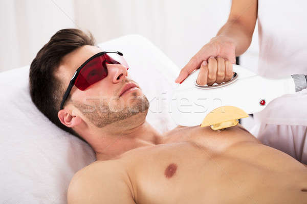 Man laser huidbehandeling jonge man gezonde Stockfoto © AndreyPopov