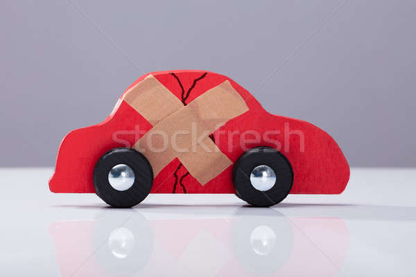 Broken Car With Cross Band Aid Stock photo © AndreyPopov