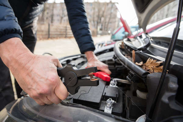 Person Using Jumper Cables To Charge Car's Dead Battery Stock photo © AndreyPopov
