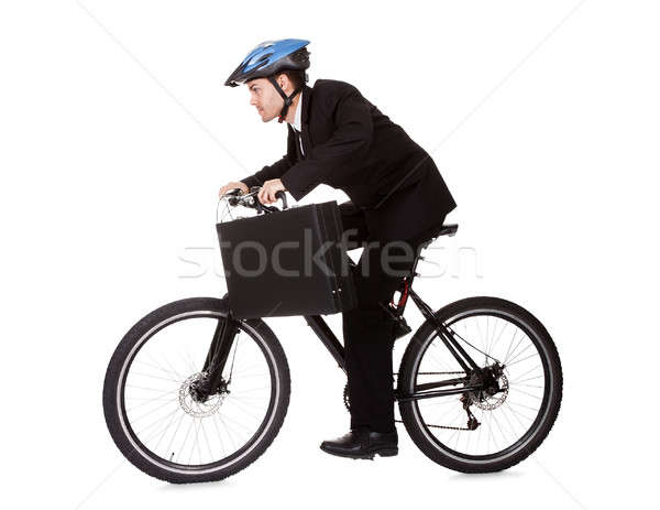 Imprenditore equitazione bicicletta lavoro suit Foto d'archivio © AndreyPopov