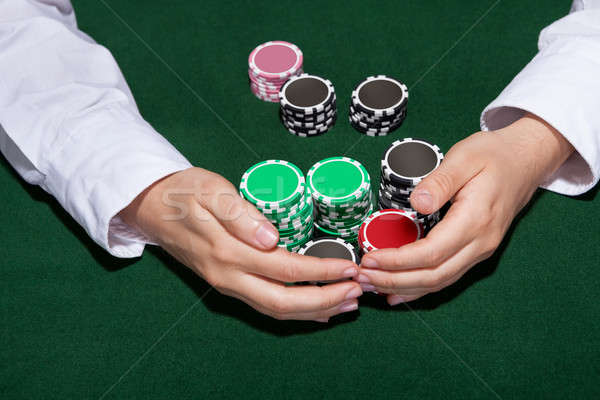 Croupier collecting in the bets Stock photo © AndreyPopov