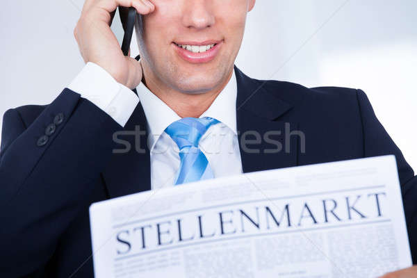 Zdjęcia stock: Biznesmen · czytania · gazety · nagłówek · pracy · rynku