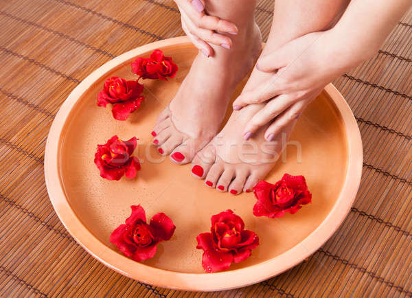 Female Feet Getting Aroma Therapy Stock photo © AndreyPopov