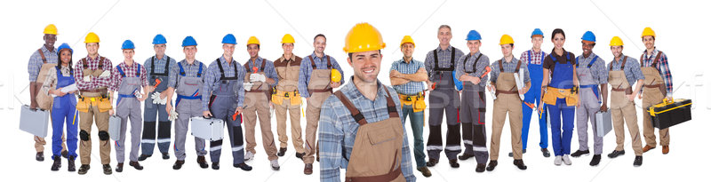 Muncitor in constructii colegii alb portret fericit în picioare Imagine de stoc © AndreyPopov