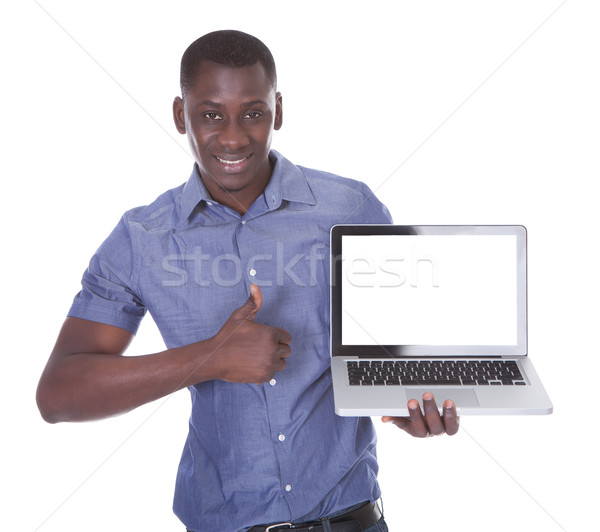 Man Pointing Towards Laptop Stock photo © AndreyPopov