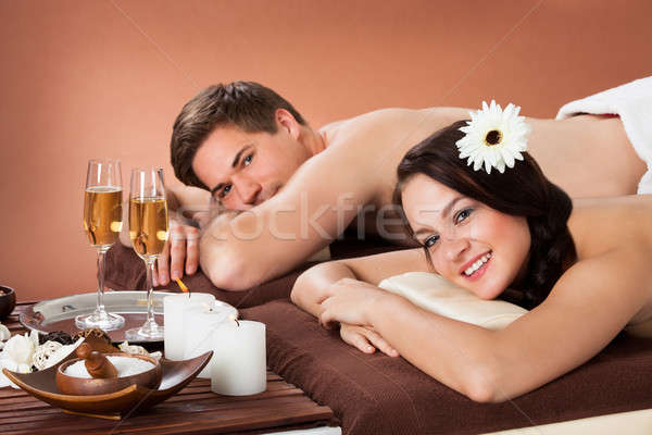 Smiling Couple Relaxing In Beauty Spa Stock photo © AndreyPopov