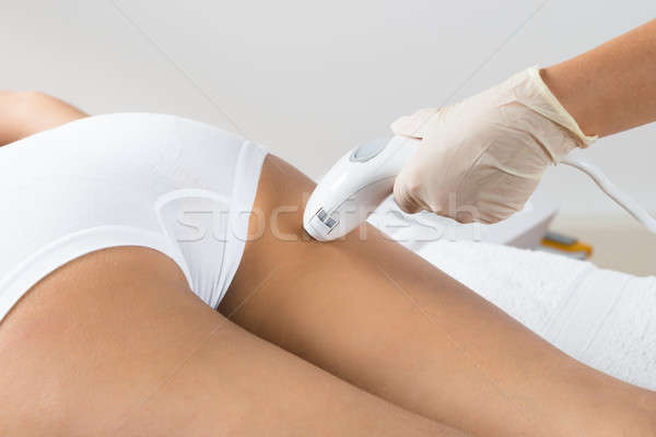 Kobieta laserowe leczenie pośladek Zdjęcia stock © AndreyPopov