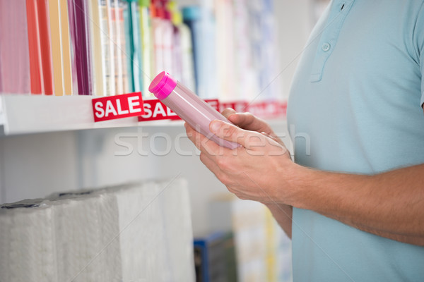 Midsection Of Customer Holding Cosmetic Bottle Stock photo © AndreyPopov
