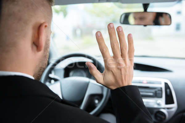 Man Sitting On Self Drive Car Seat Stock photo © AndreyPopov