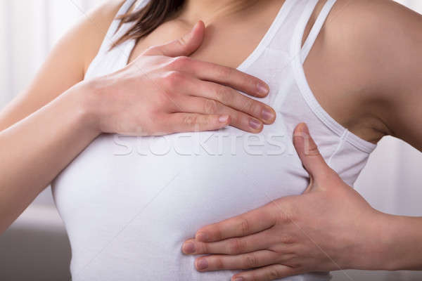 Woman Suffering From Breast Pain Stock photo © AndreyPopov