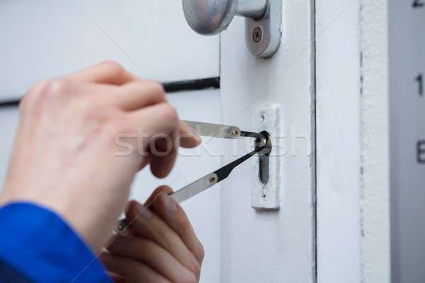 Close-up Of A Person Opening Doors Stock photo © AndreyPopov