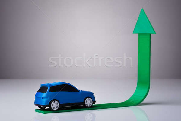Blue Car Driving On Green Upward Arrow Stock photo © AndreyPopov
