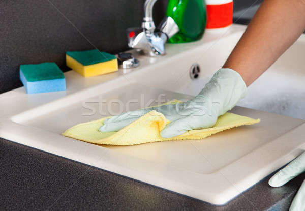 Woman Cleaning Worktop Stock photo © AndreyPopov