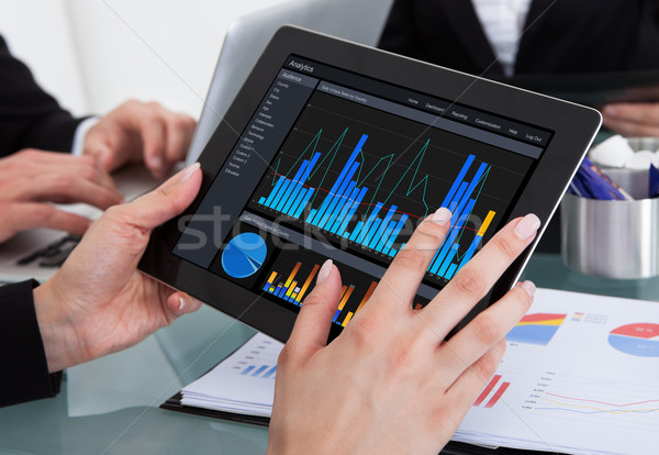 Businesspeople Working At Desk Stock photo © AndreyPopov