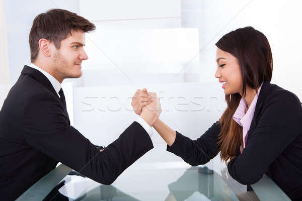 Business Colleagues Arm Wrestling Stock photo © AndreyPopov