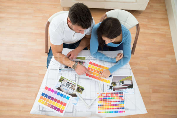 Young Couple Choosing Color From Swatch Stock photo © AndreyPopov