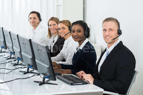 Businesspeople Working In Call Center Stock photo © AndreyPopov
