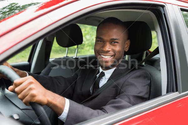 Happy Businessman Driving Car Stock photo © AndreyPopov