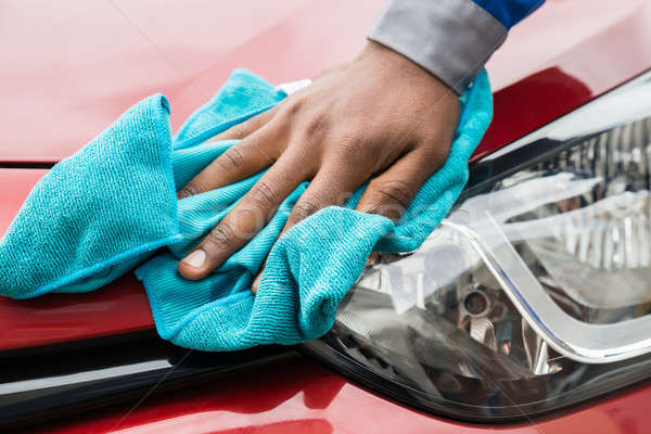 Worker Cleaning Car Headlight Stock photo © AndreyPopov