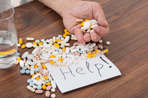 Személy tart tabletták kéz segítség szöveg Stock fotó © AndreyPopov