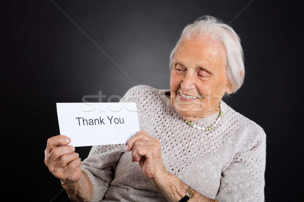 Elder Woman Showing Thank You Card Stock photo © AndreyPopov