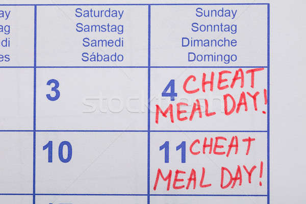 Cheat Meal Day Text Written On Calendar Stock photo © AndreyPopov
