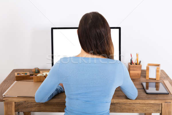 女子 坐在 桌面 後視圖 家 工作 商業照片 © AndreyPopov