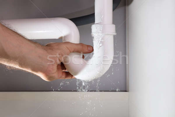 Male Hand's Holding The White Sink Stock photo © AndreyPopov