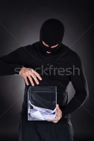 Criminal trying to access ballot box Stock photo © AndreyPopov