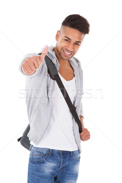 Handsome Student Carrying Shoulder Bag Stock photo © AndreyPopov