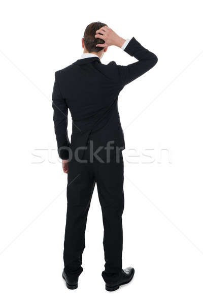 Stock photo: Confused Businessman Scratching His Head