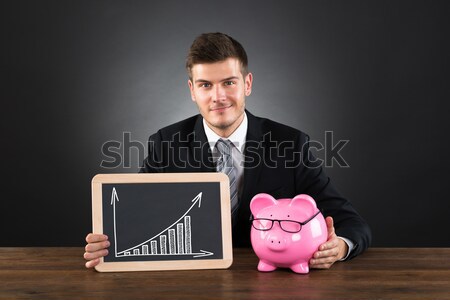 Stock photo: Businessman Calculating Invoices