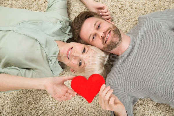 Couple tapis coeur heureux [[stock_photo]] © AndreyPopov