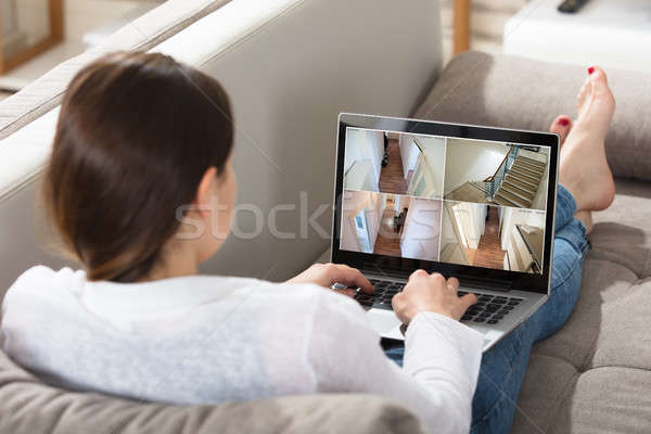 Foto stock: Mujer · cctv · portátil · sesión