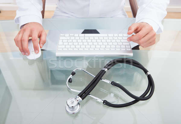 Stethoscope on a doctors desk Stock photo © AndreyPopov