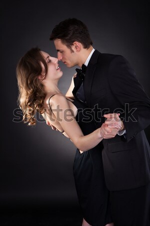 Homem beijando mulher pescoço vestir cinta Foto stock © AndreyPopov