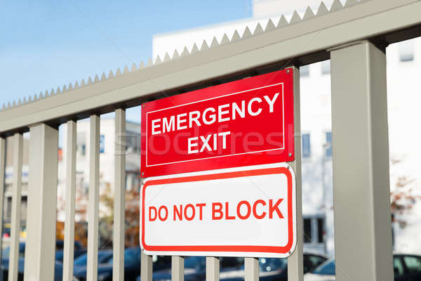 Emergency Exit And Do Not Block Signboard Stock photo © AndreyPopov