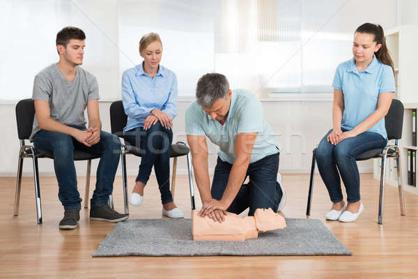 Instructor Teaching First Aid Cpr Technique Stock photo © AndreyPopov